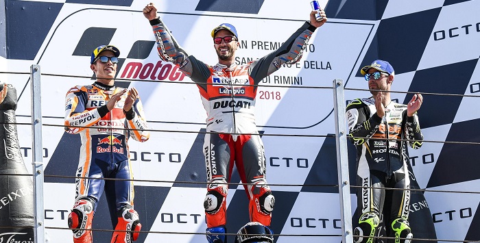 Misano Adriatico (Italy), 09/09/2018.- Italian rider Andrea Dovizioso (C) of Ducati Team celebrates on the podium with second placed, Spanish rider Marc Marquez of Repsol Honda (L) and third placed British rider Cal Crutchlow of CWM LCR Honda after winning the MotoGP race of the Grand Prix of San Marino and the Rimini Riviera at Misano circuit, in Misano Adriatico, Italy, 09 September 2018. (Motociclismo, Ciclismo, Italia) EFE/EPA/PASQUALE BOVE