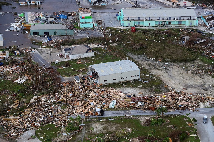 Marsh Harbour (Bahamas), 03/09/2019.- A handout picture provided by the British Ministry of Defence (MOD) showing an ariel image of damage caused by Hurricane Dorian to the island Great Abaco, Bahamas, 03 September 2019, issued 05 September 2019. The island was one of the first to get hit by Hurricane Dorian after she turned in to a category 5 hurricane. The British Navy Royal Fleet Auxilary RFA Mounts is embarked with a Wildcat helicopter that has been conducting reconnaissance flights over the islands to assess the damage and provide important intelligence to The Bahamian government and the team of DFID experts who have deployed to the region. RFA Mounts Bay is equipped with a dedicated Humanitarian and Disaster Relief team made up of personnel from the Royal Engineers and Royal Logistic Corps team and is carrying vital aid and specialist equipment, such as all-terrain quads, dump trucks, diggers and stores. The ship is also able to provide essential medical care. EFE/EPA/LPhot Paul Halliwell / BRITISH MINISTRY OF DEFENCE/HANDOUT MANDATORY CREDIT: MOD/CROWN COPYRIGHT HANDOUT EDITORIAL USE ONLY/NO SALES